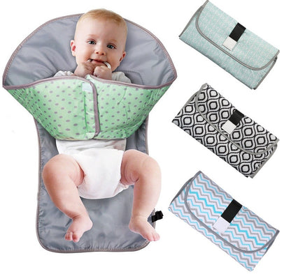 Portable Baby Changing Pad f9660fdb1b44da0738b6b3fc46d2ebd8